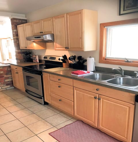 Cabin Ten Full Kitchen includes Dishwasher, Full Range with Oven.