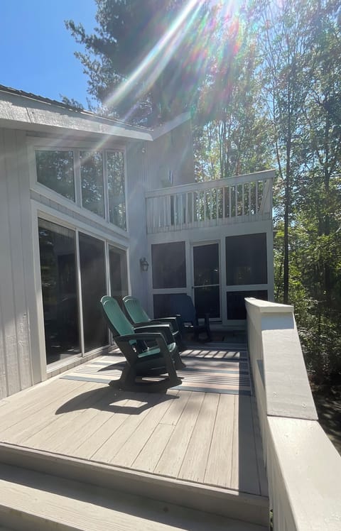 Large sunny deck and screen porch, perfect place to relax day or night