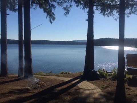 Path from deck to beach...fire pit and lawn swing overlooking water ...
