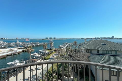 Marina views from your private balcony — coffee or cocktails, your choice.