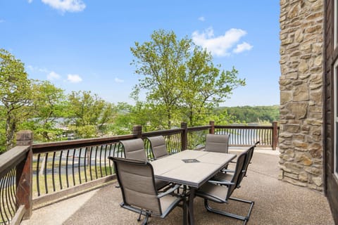 Large deck with two outdoor tables (views vary)