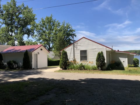 Front side of cottage on right & Casita bedroom & bath on left.