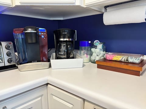 Keurig, regular coffee maker, tea, sugar, creamer, etc.