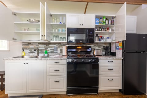Enjoy cooking your own meals with a fully stocked kitchen!