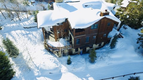 Rear aerial showing ski trail and easy access from ski room door to the trail