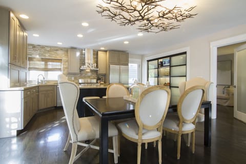  Glass Pantry doors where dishes  are kept plus a small TV 