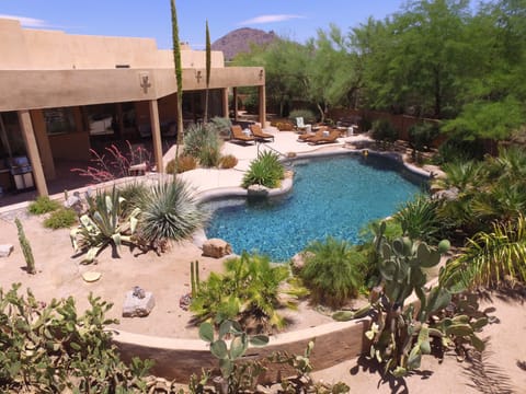South facing private backyard pool and coveted deck.