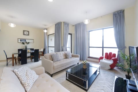 Well lit spacious living and dining area