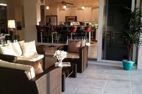 indoor/outdoor room open to kitchen