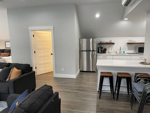 Kitchenette comes with hot plates, pots and pans, microwave, dishes, Keurig