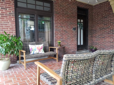 Spacious Front Porch is a great place to linger