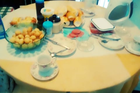 A delicious breakfast served on the porch of the house.