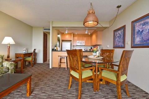 Dining area featuring a 4-seater round table, perfect for shared meals