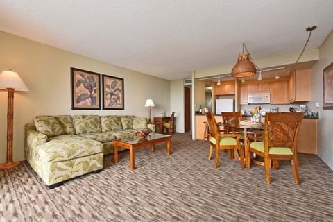 Relax in the inviting living room, complete with a comfortable L-shape sleeper sofa