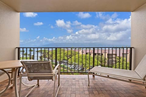Private furnished lanai with the view of the Pacific and neighboring island