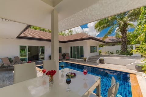 Private swimming pool and outsite sitting area