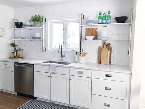 Full kitchen complete with stove, microwave, dishwasher and eat in dining nook.