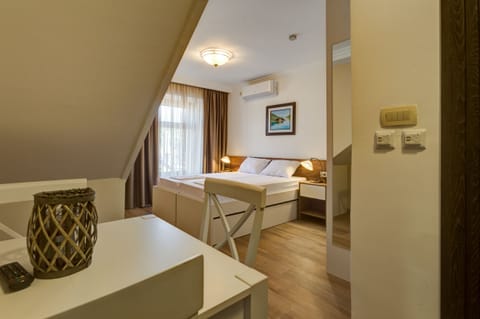 Comfortable triple studio with private bathroom.