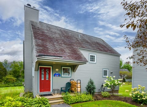 Welcome! Summer in VT. Summer view of the house with the flowers in bloom.
