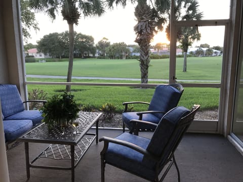 back lanai over looking 18th fairway at sunset