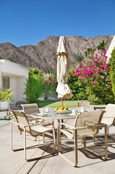Al Fresco dining poolside while enjoying dramatic mountain views