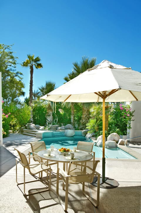 Relax poolside with cocktails and al fresco dining