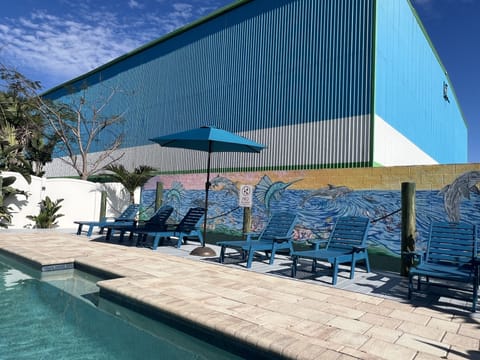 Pool, deck and lounge chairs