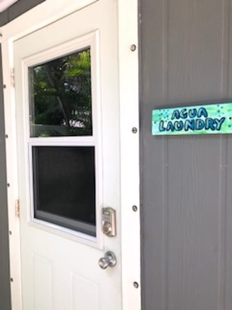 Players room with full size washer and dryer 
