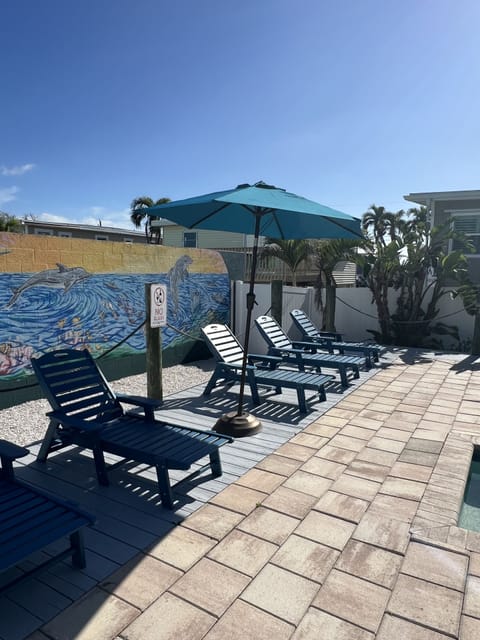 Pool deck and lounge chairs