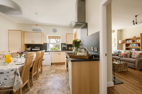 Kitchen leads through to the spacious sitting room