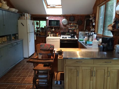 Kitchen of large cabin - opens to dining area