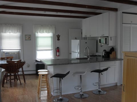 Ki
tchen with Cathedral ceiling open to living room