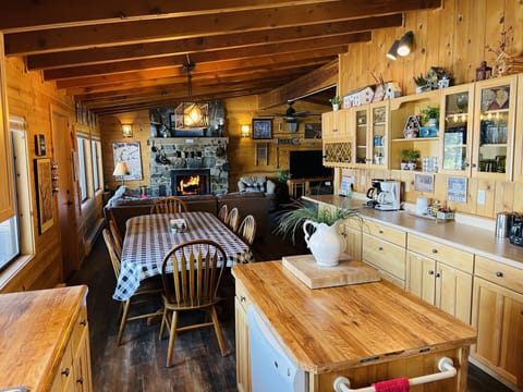 Table seats 10 comfortably. Folding table and chairs in front closet.