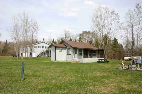 Cabin 5 outside view shows upper house in rear
