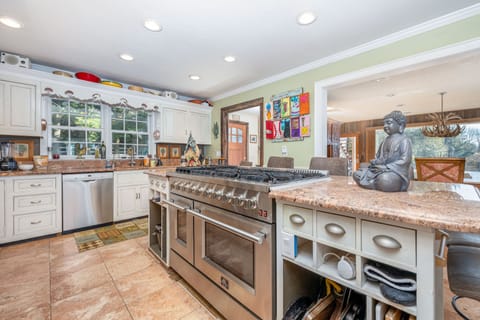 State-of-the-art kitchen and two outside grills as well with plenty of charcoal