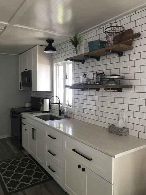 Fully stocked kitchen with view of the lake.