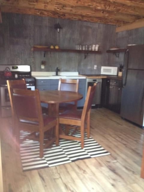 kitchen showcases antique metal sink from original cabin