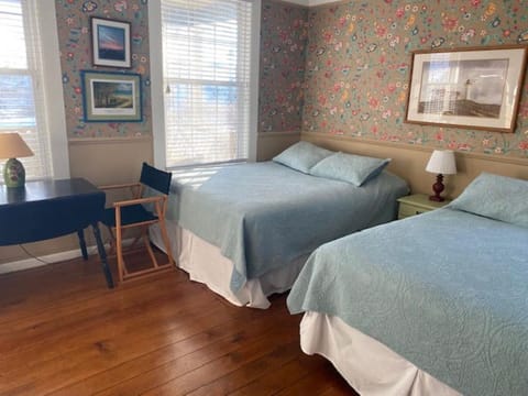 Two queen beds, full bath and kitchenette