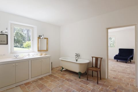 ground floor bathroom between dressing and master bedroom 