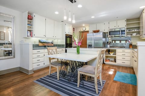 Kitchen with island, new appliances, everything you need.