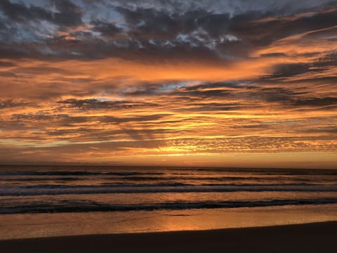 Stunning Sunrise from the Beach in front of the Sandcastles Condo