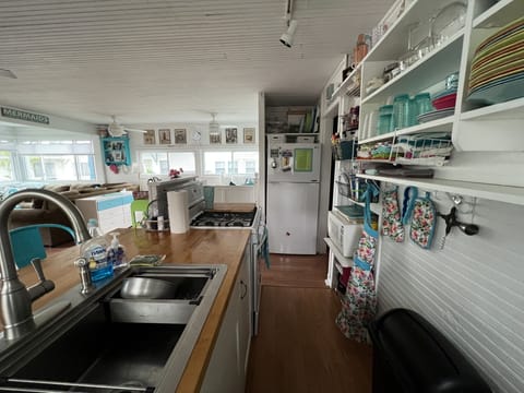 Large sink, full size Range, and full size Refrigerator