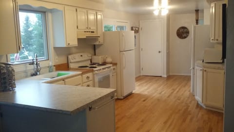 Kitchen
Has 2 (empty) Refrigerator/freezer spaces. There is no dishwasher.