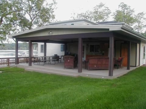 new veranda right outside kithcen with beautiful view of lake