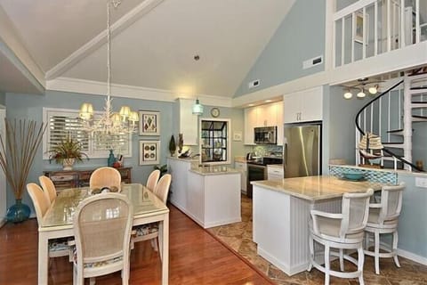 Kitchen and dining area.  Table for six and countertop seating for two.