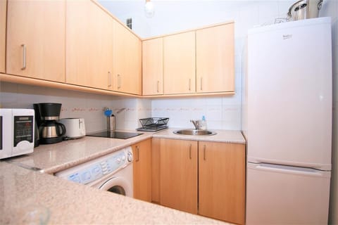 Another view of the limited kitchen from the serving bar