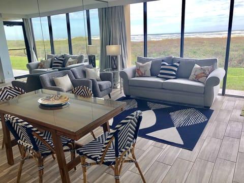 Living/Dining Area with Floor to Ceiling Windows and Ocean View