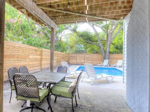 Outdoor patio dining by the pool