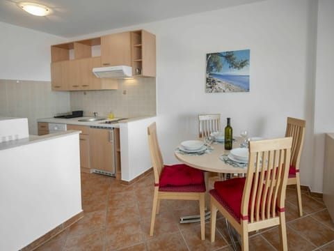 Furniture, Cabinetry, Table, Chair, Building, Wood, Interior Design, Countertop, Kitchen Stove, Floor