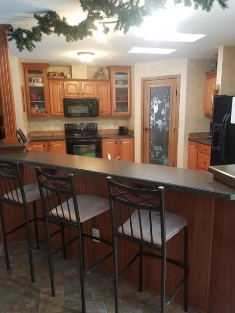 Island with seating for 4, dining room table with seating for 6-8 (bench seat)